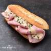 Warme beenham met honing mosterd saus (baquette)